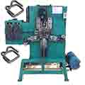 Strapping buckle machine