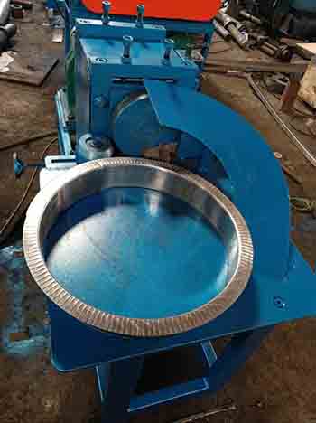 Machine for making inner heavy-duty protector of steel coil